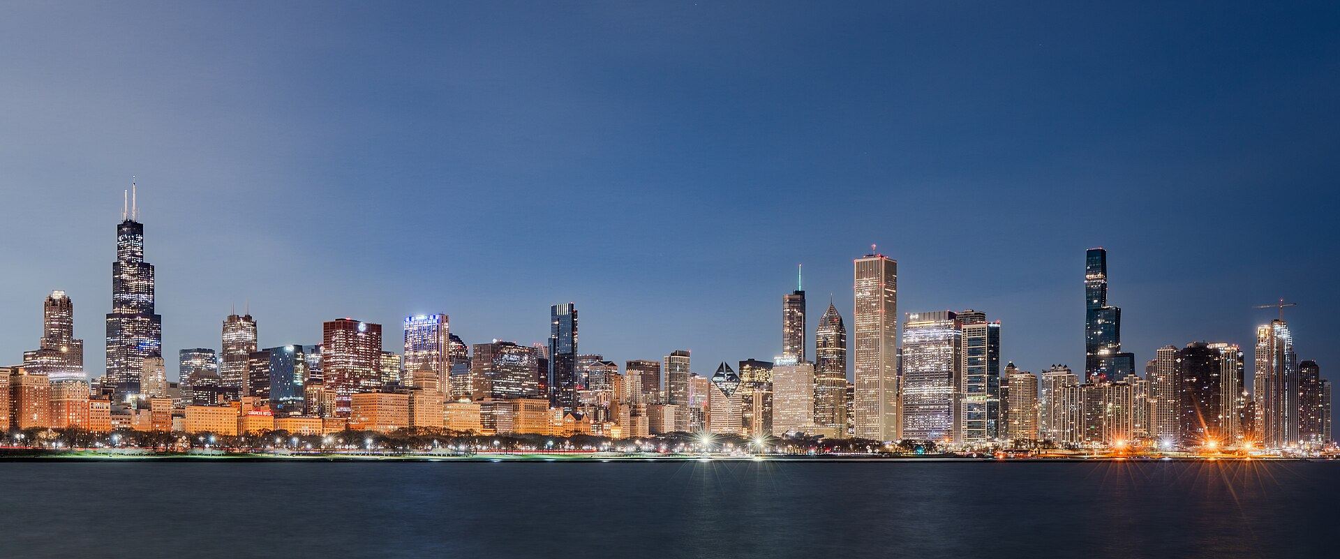 The Chicago skyline at sunrise across Lake Michigan